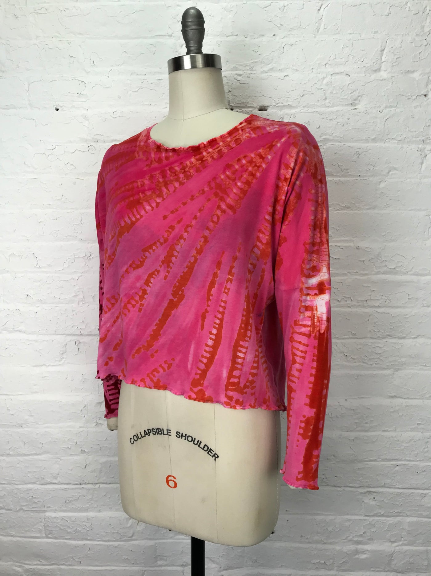 Juni Long Sleeve Petite Top in Pink and Orange Spiderwebs - One size