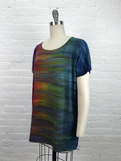 Astrid Mini in Spectro - a short sleeve, loose cut tunic in rainbow tones, made of cozy bamboo jersey which feels great on the skin - size S/M -side view