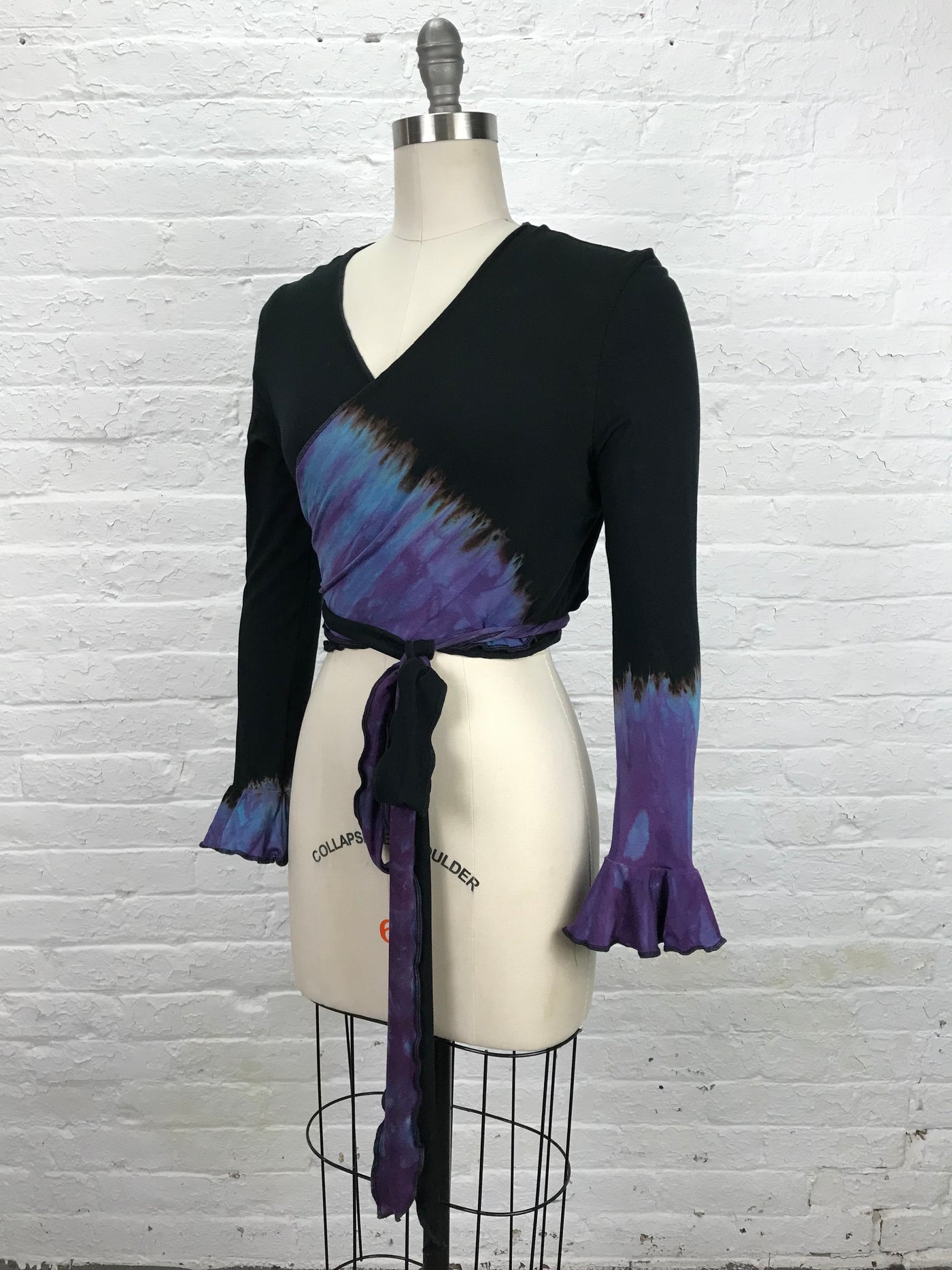 Flamenco Wrap Top in Black and Blue - side view